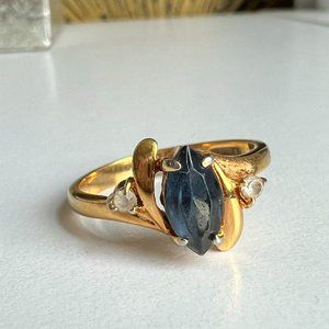 Gold ring with Navy blue stone